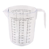 Clear plastic Measuring Cup with measurement markings for precise cooking and baking.